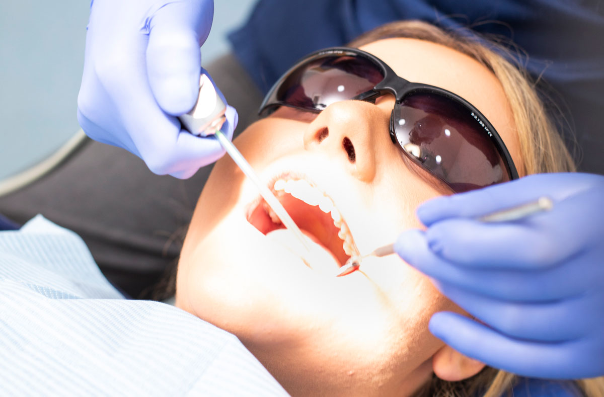 Patient being treated in dental chair