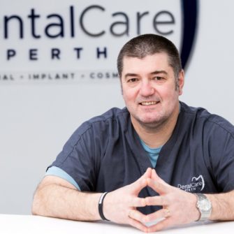 Pictured Dr Constantinos (Dino) Loizides at
his Perth dental practice, which has recently been acquired by Clyde Munro Dental Group